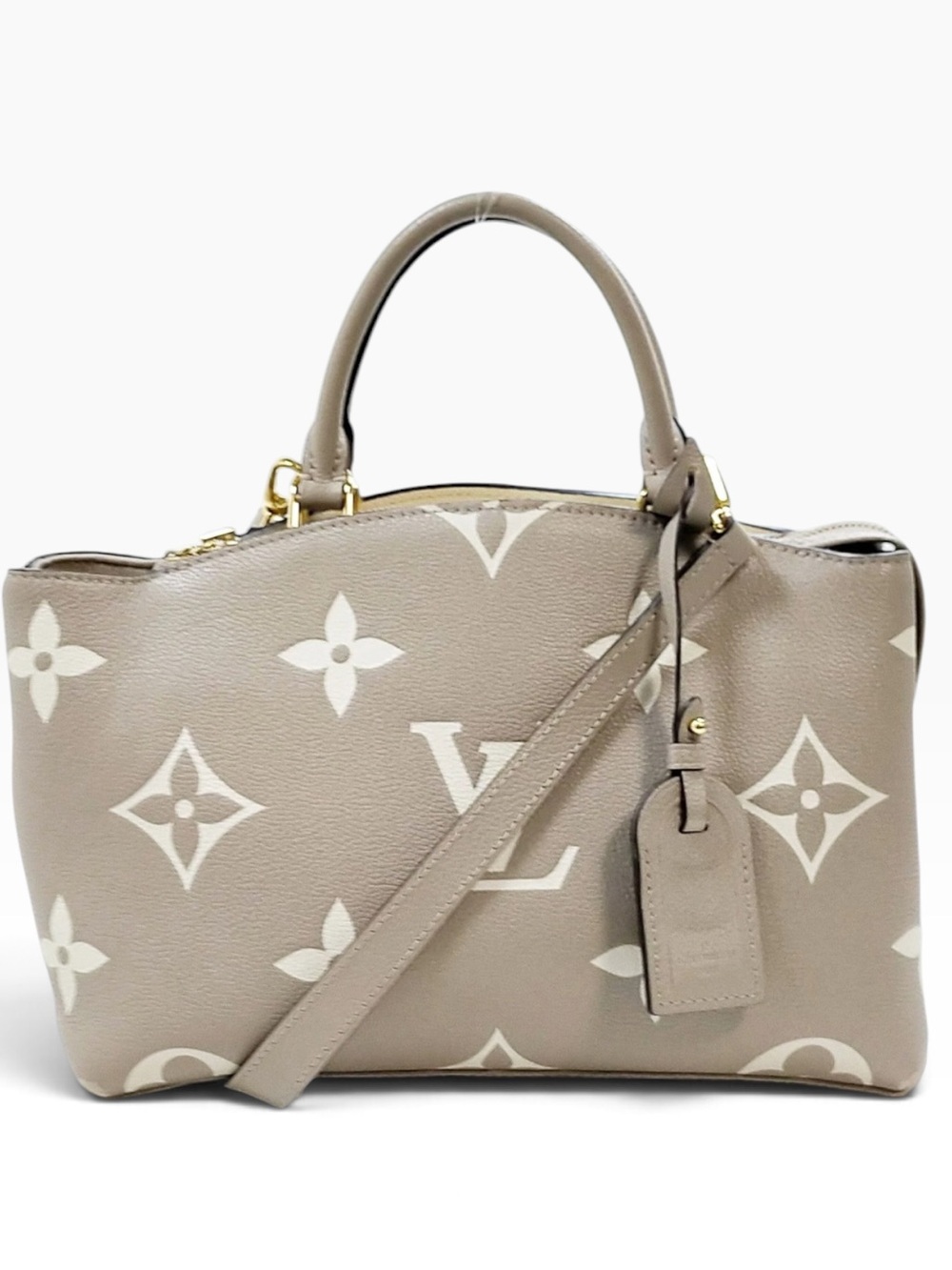 Louis Vuitton 2-way tote crafted in Monogram Empreinte leather Original Strap